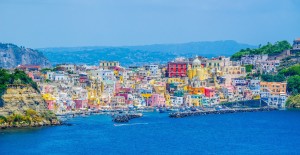 italian island procida is famous for its colorful marina, tiny narrow streets and many beaches which all together attract every year crowds of tourists coming from naples - napoli.
