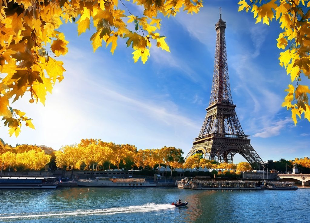 Paris in Fall, autumn. One indoor activity is a film night, stay cozy indoors at home whilst exploring foreign cities through film.