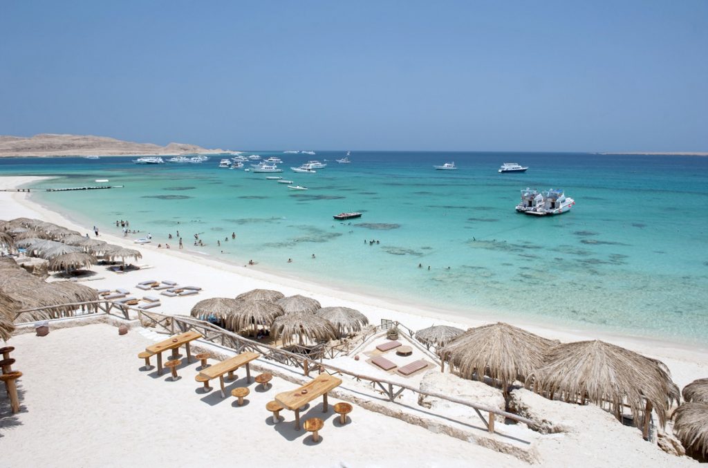 egypt white sand blue sea beach, one of the best destinations to visit in spring