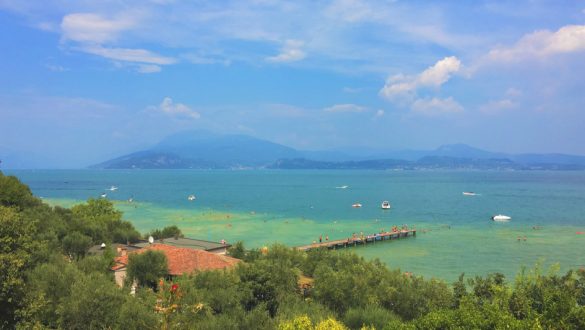 View out over the Sirmione peninsula and Jamaica beach. One of the best places to visit in Lake Garda. With SpaDreams