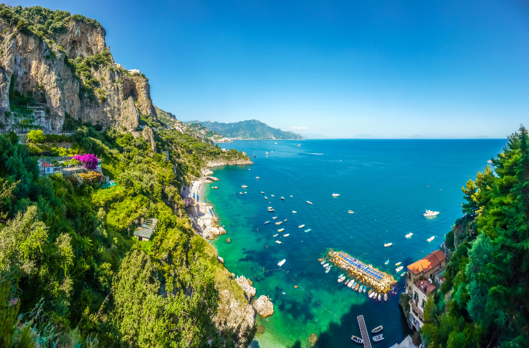 Scenic picture-postcard view of famous Amalfi Coast with beautiful Gulf of Salerno, Campania, Italy. Ischia, island of thermal springs.