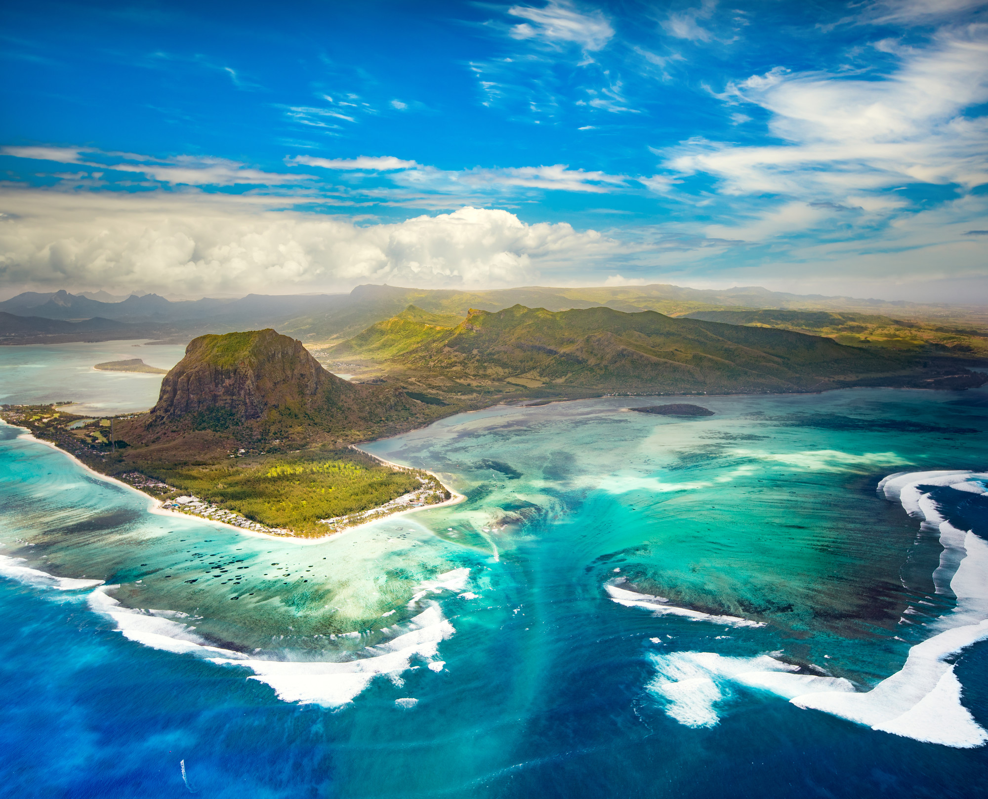 Aerial view of the underwater waterfall and Le Morne Brabant peninsula. Amazing Mauritius landscape