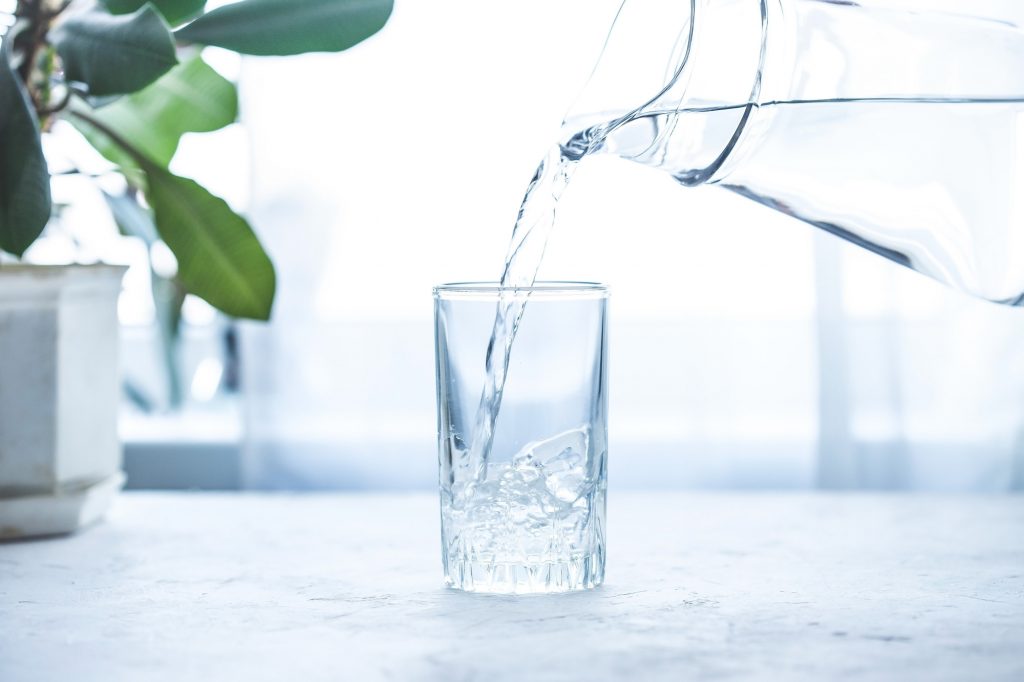 A glass of water that helps with therapeutic fasting